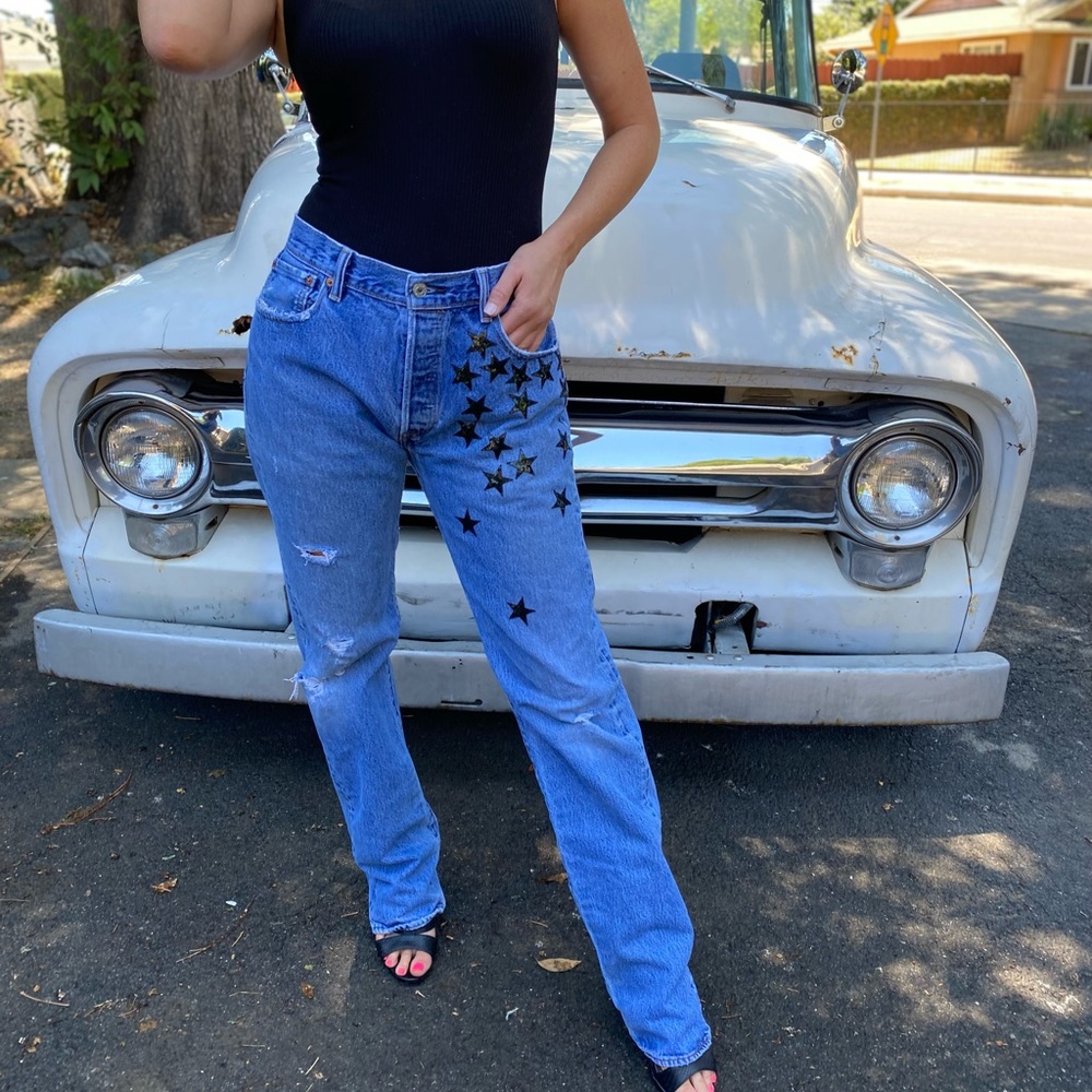 Vintage Levi’s distressed with beaded black stars